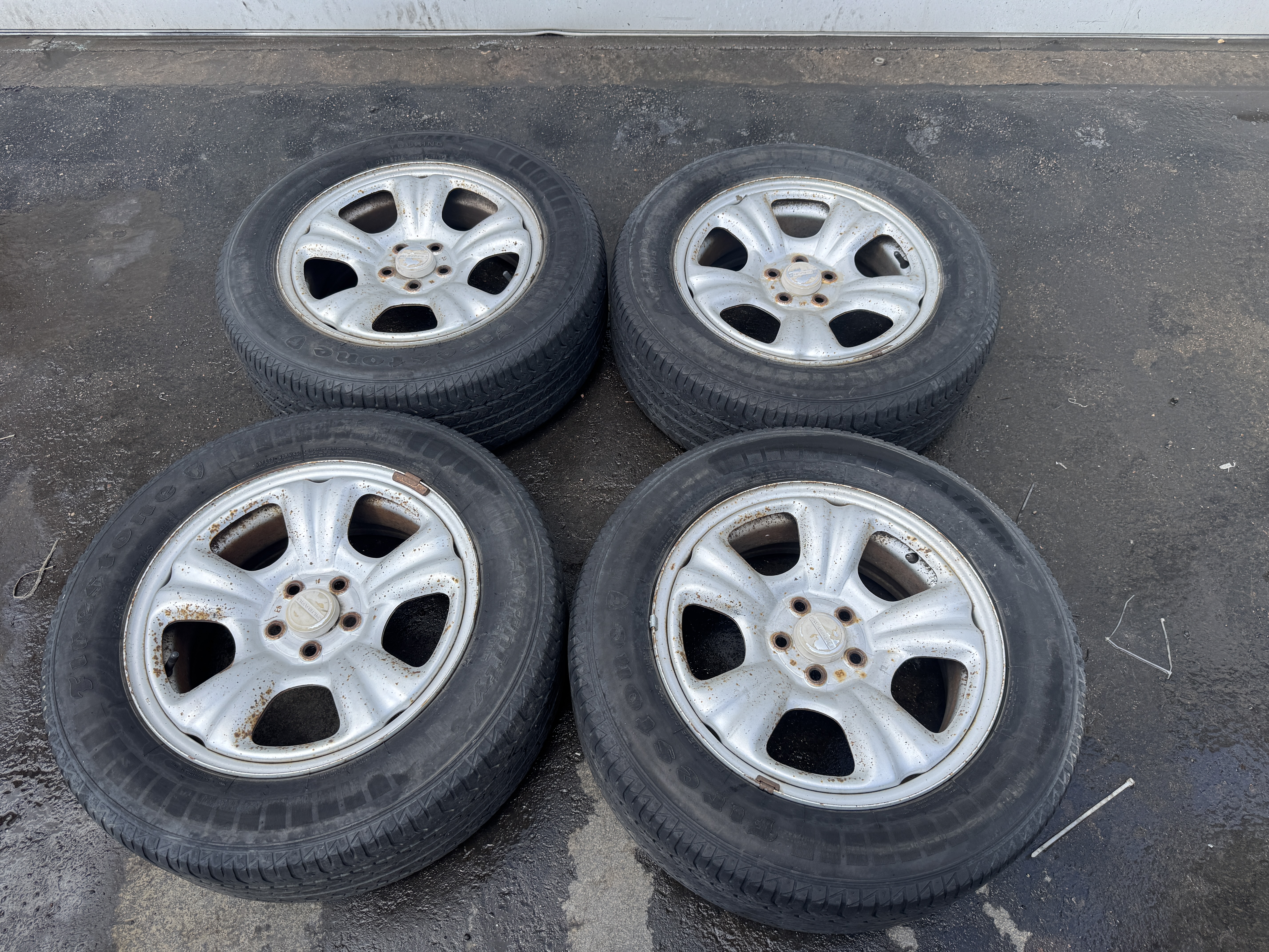 $100: 98 Forester steel wheels, tires should be replaced but good rollers 