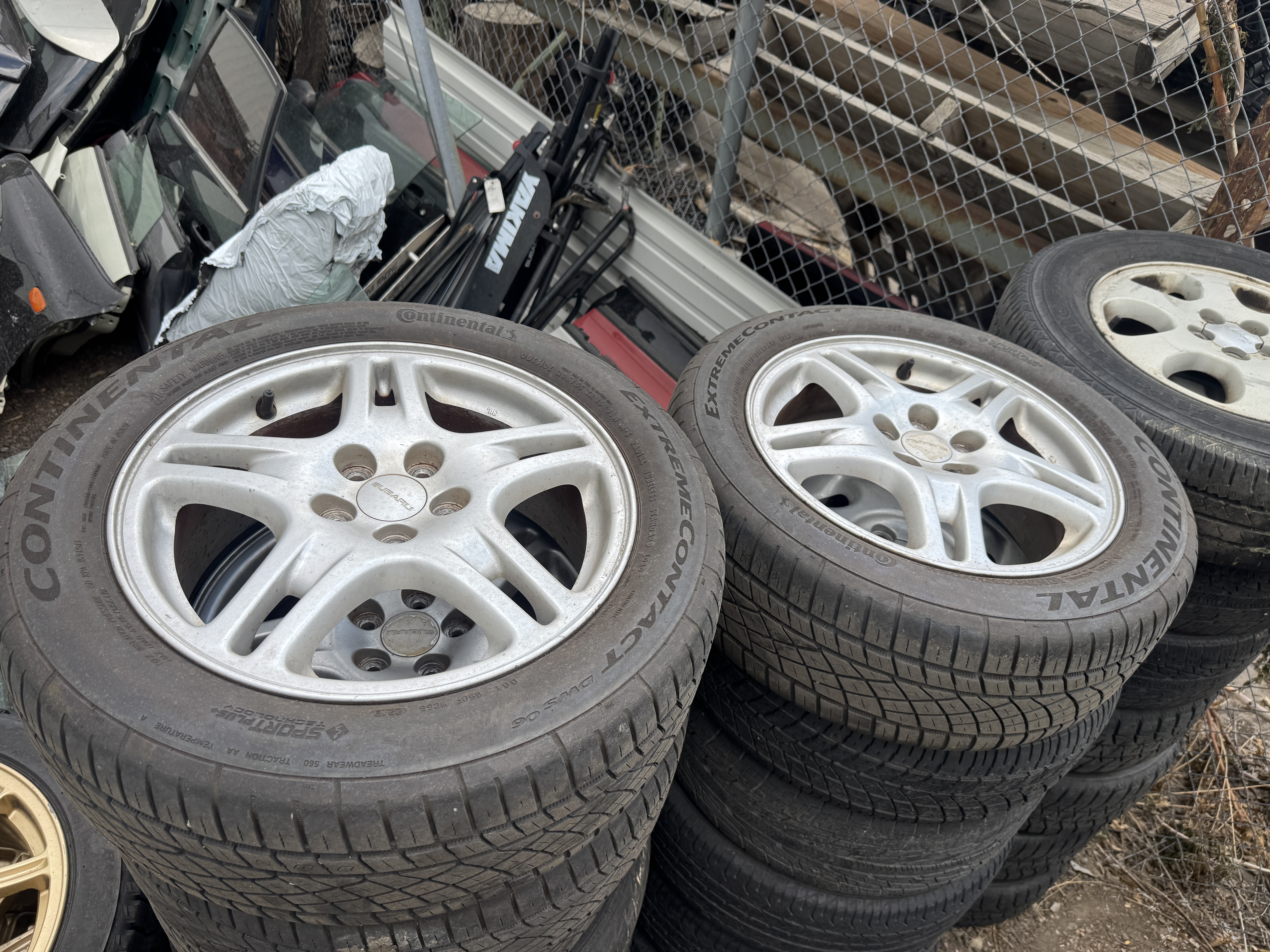 $400: 03 WRX Wheels w/Continental DWS, 205/55/16, 6-7/32nds
